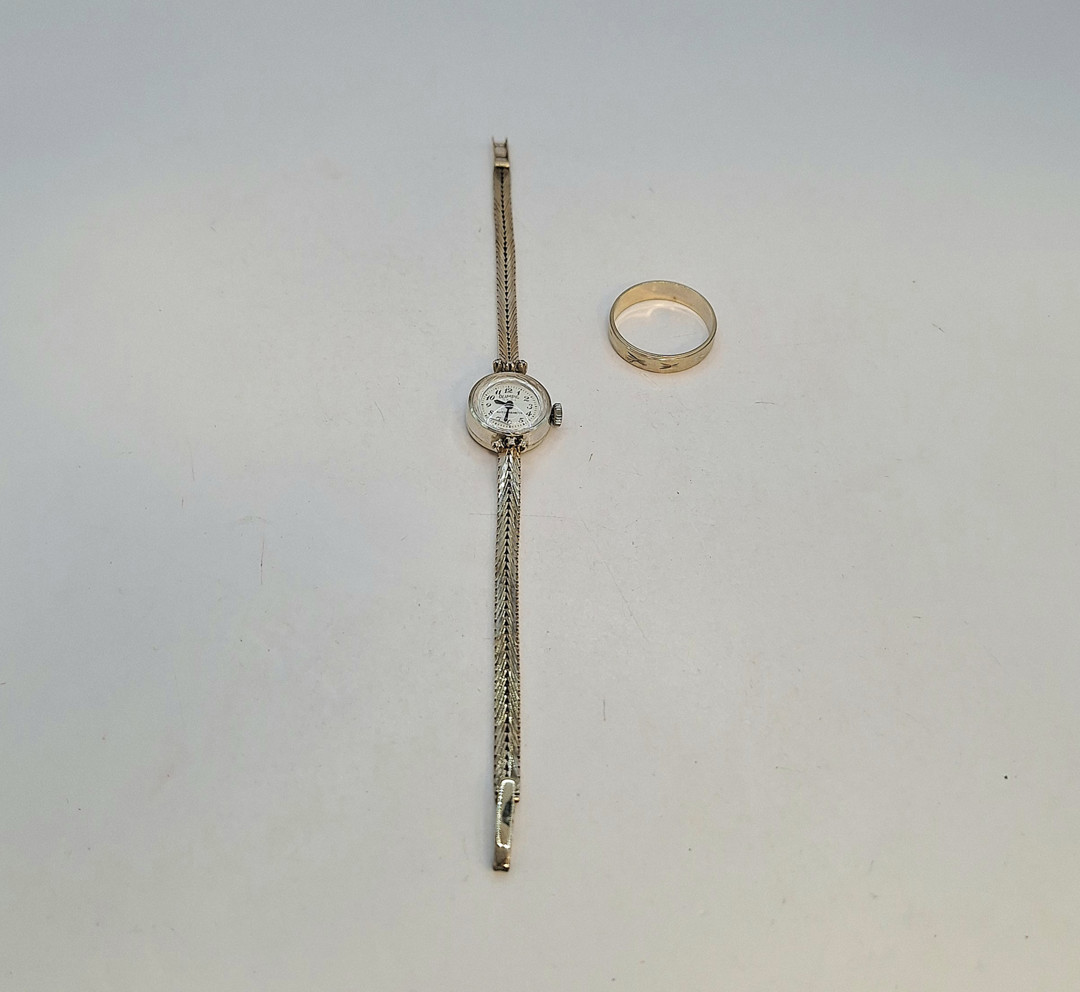 Anello e orologio oro diamantini