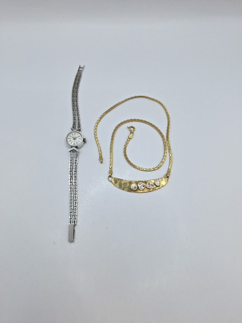 Orologio con bracciale collana oro pietre
