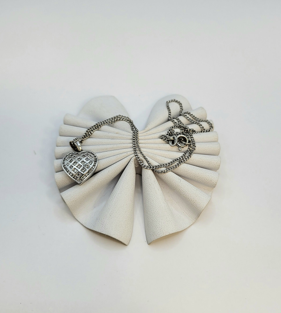 Catenina e ciondolo oro diamantini