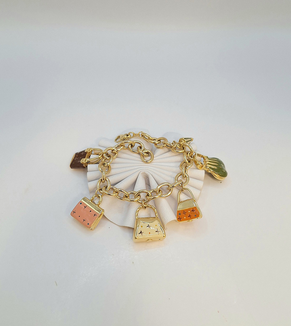 Bracciale con ciondoli oro 
