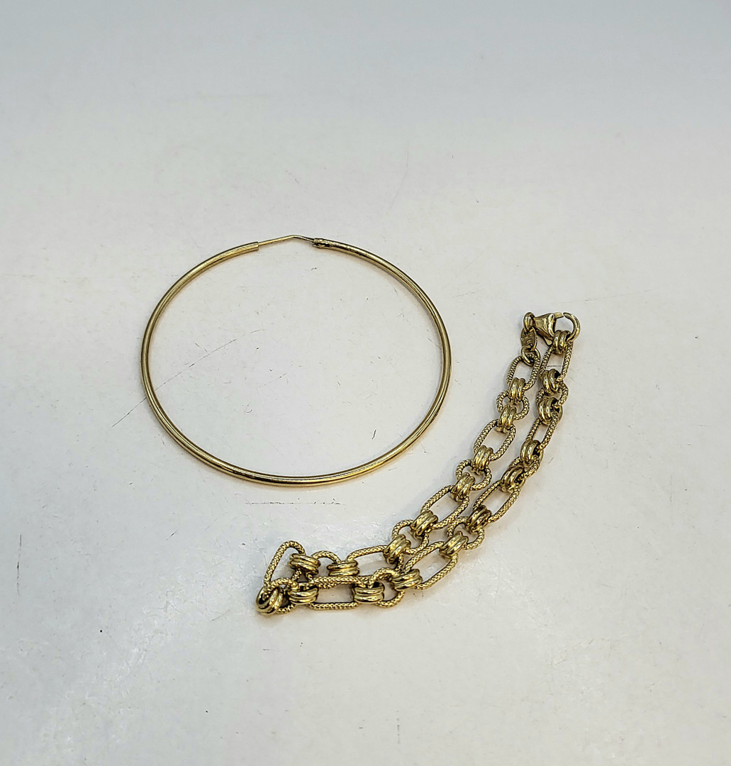 Bracciale e orecchino oro