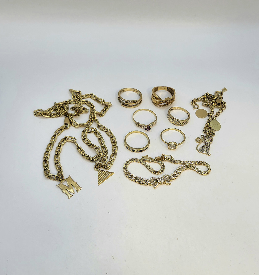 Vari oggetti oro pietre 