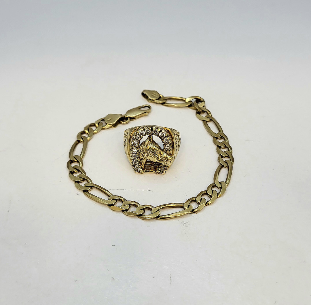 Bracciale e anello oro pietre