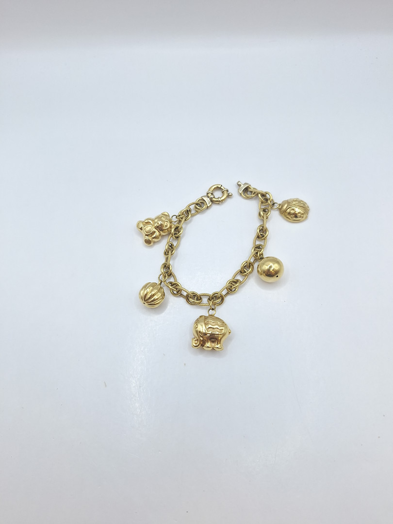 Bracciale ciondoli oro