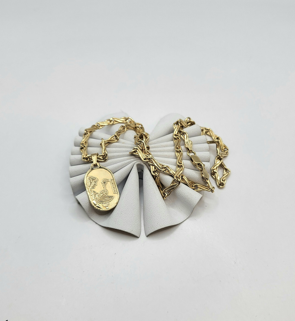 Collana e ciondolo oro