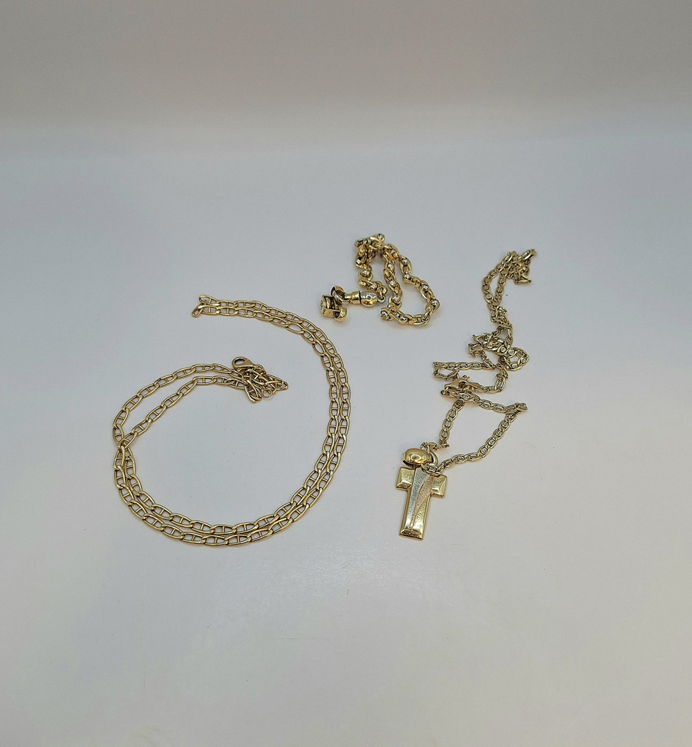 Due collane croce e bracciale oro