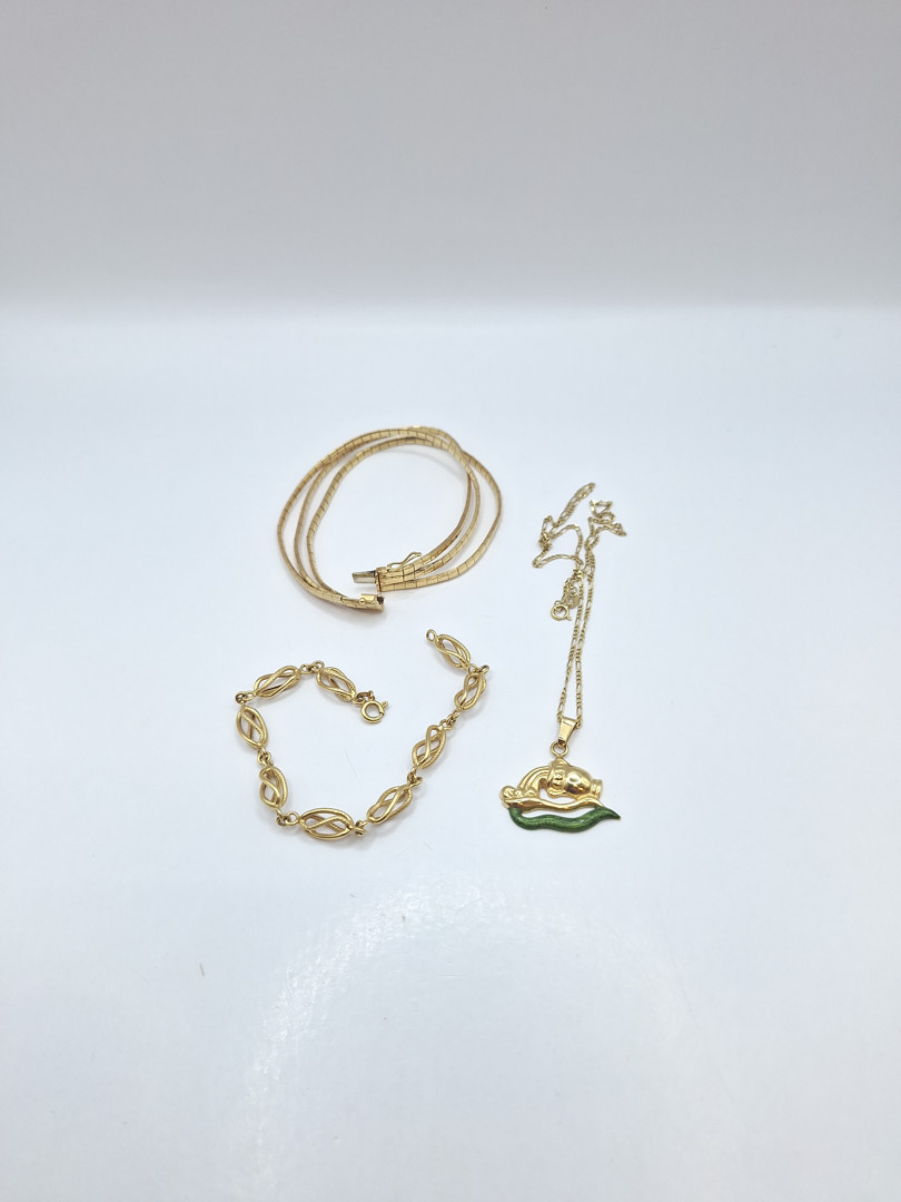 Due bracciali collana e ciondolo oro 