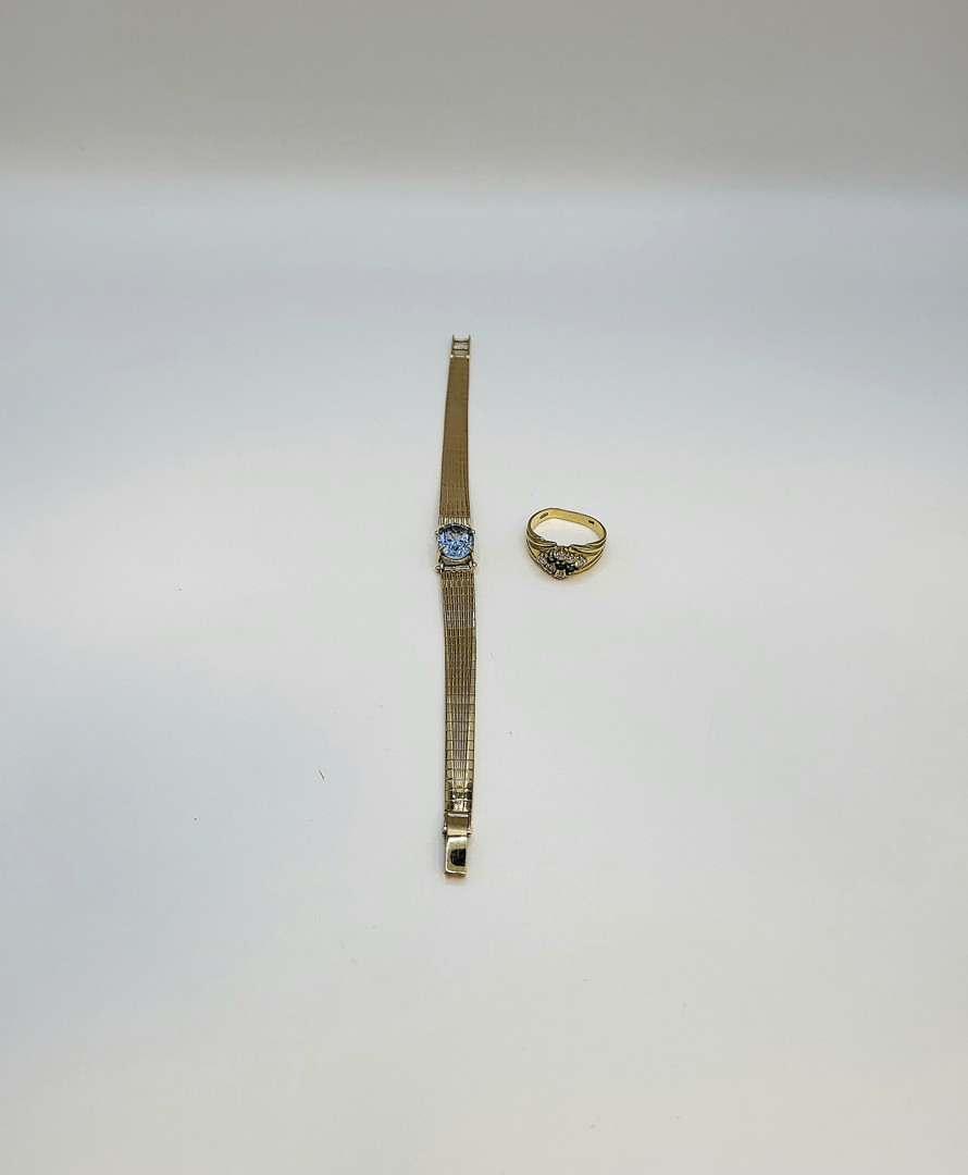 Bracciale e anello oro pietre