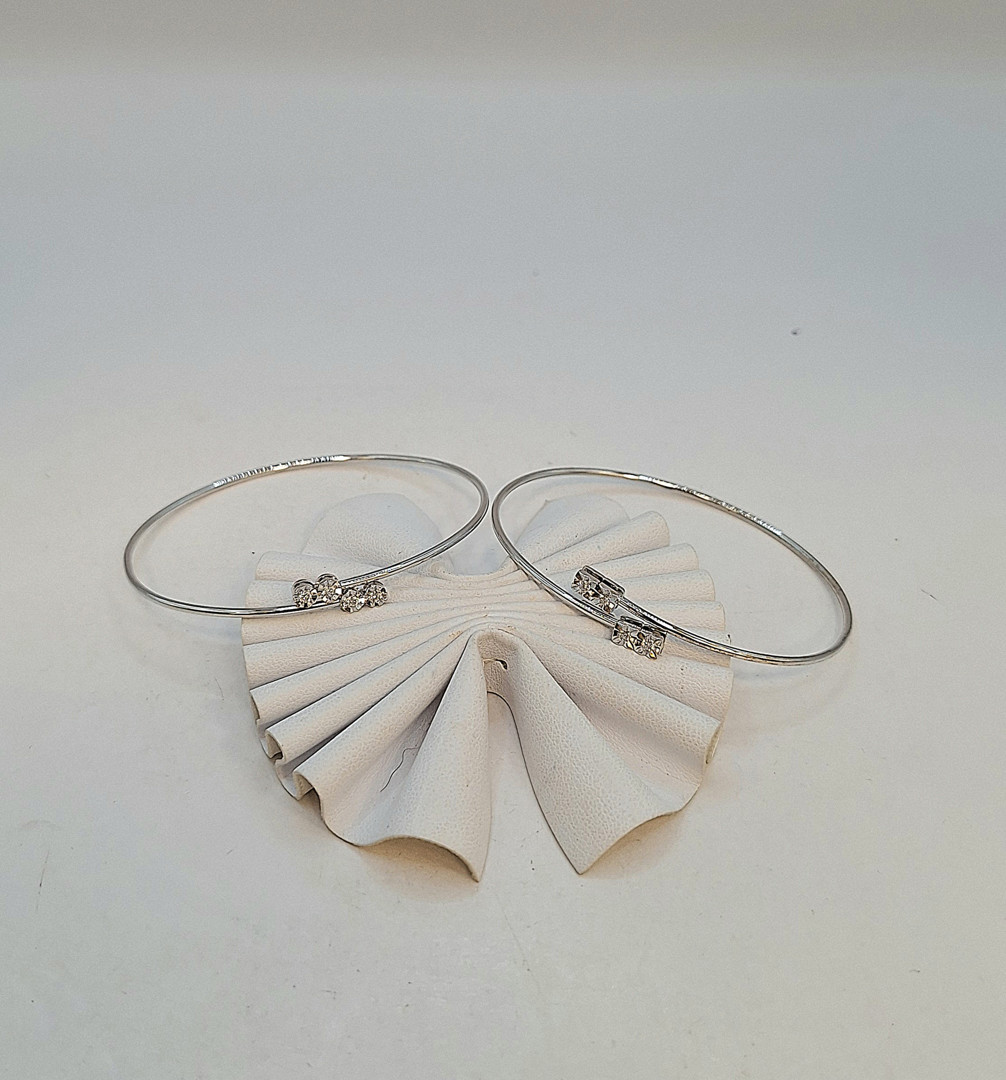 Due bracciali oro diamantini