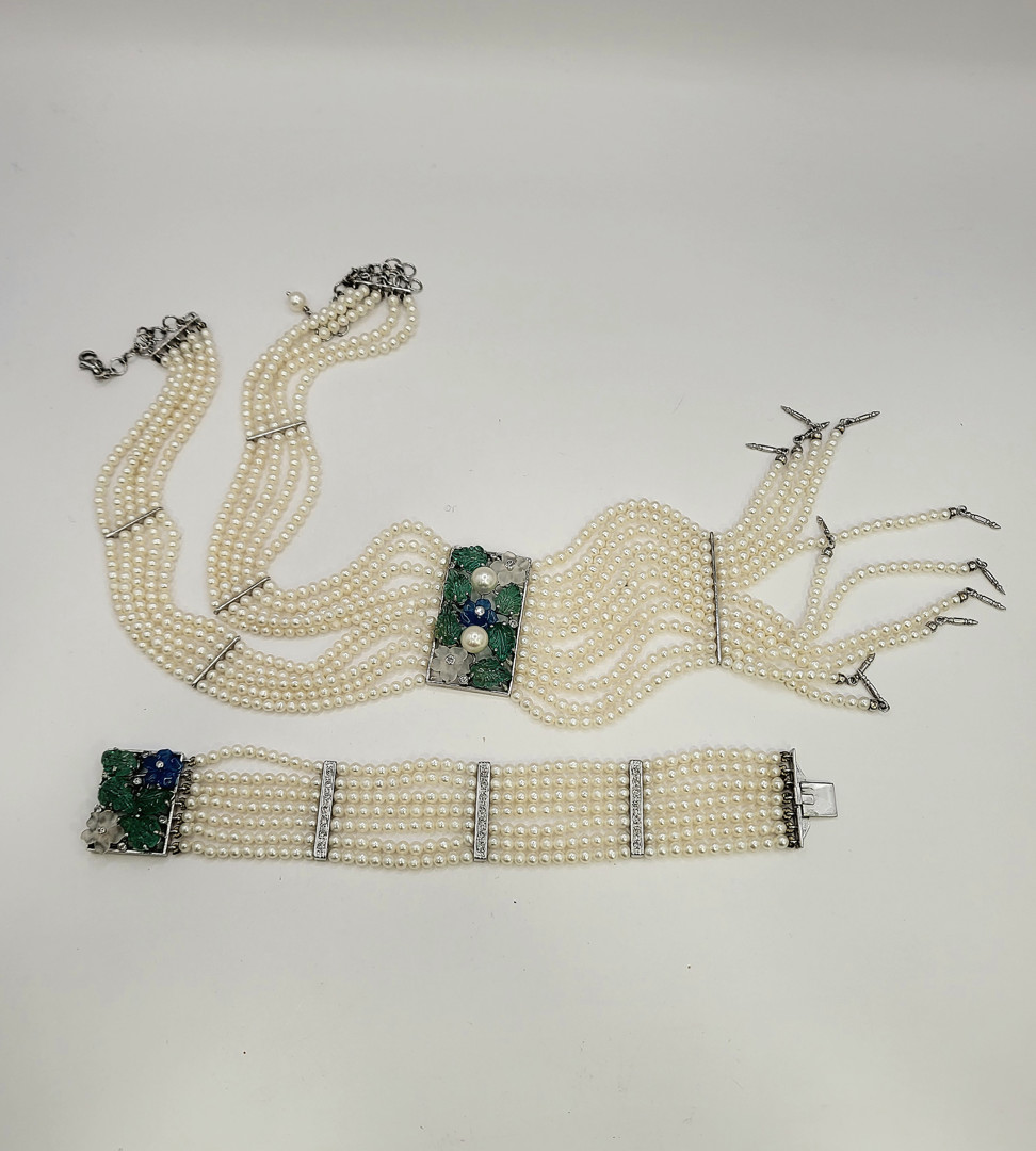 Bracciale e collana oro perle pietre diamanti