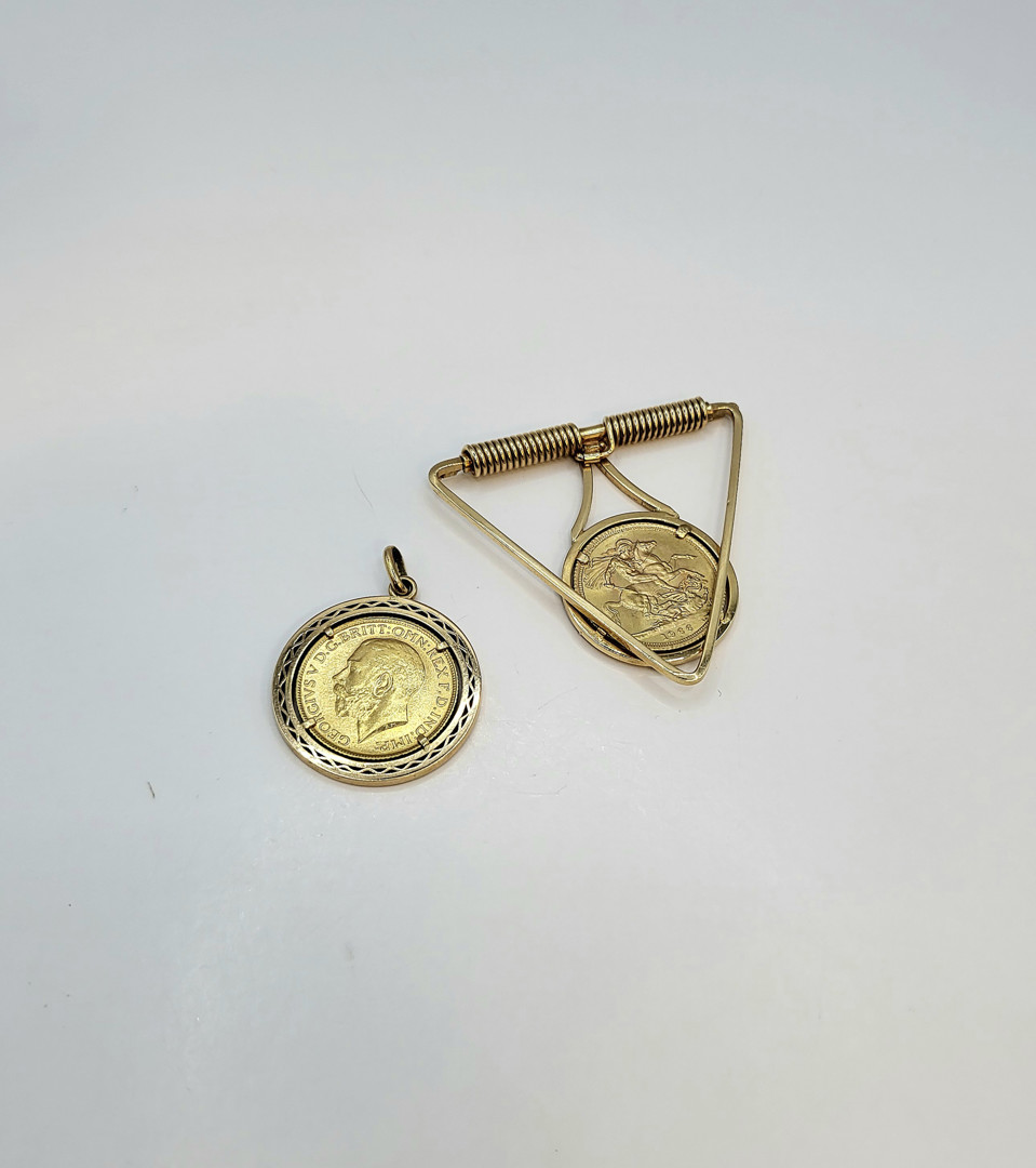 Fermasoldi e ciondolo oro 