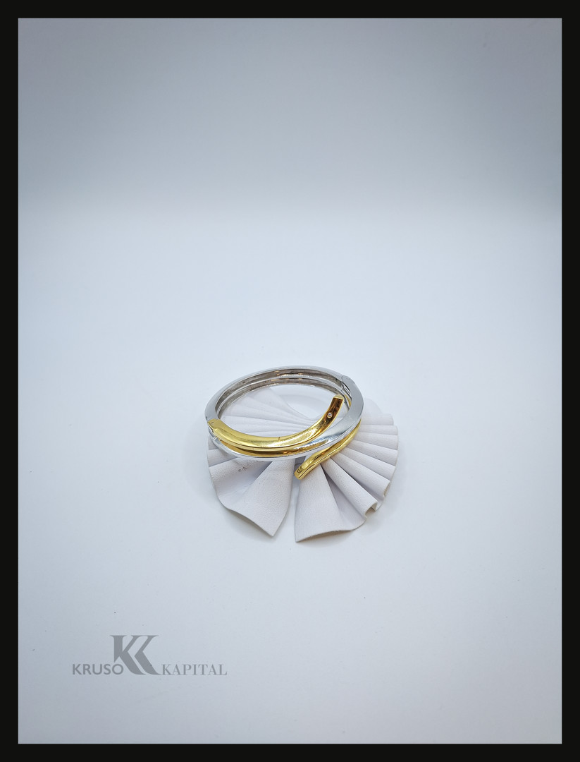 Bracciale a firma Damiani oro diamantino
