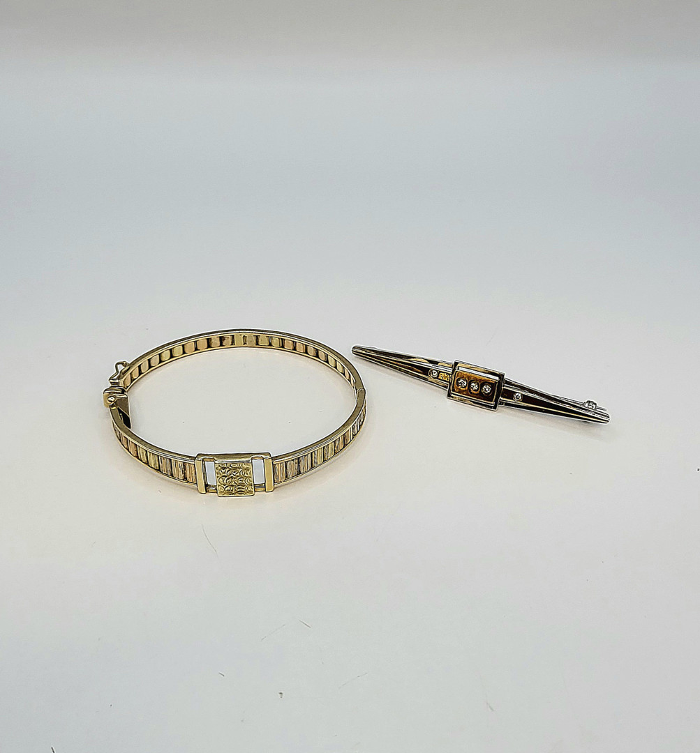 Bracciale e spilla oro diamantini 