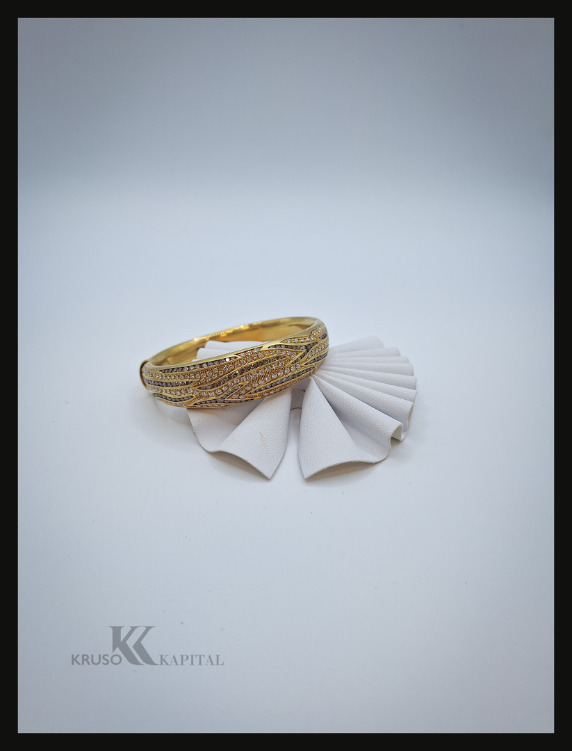 Bracciale a firma Damiani oro diamanti