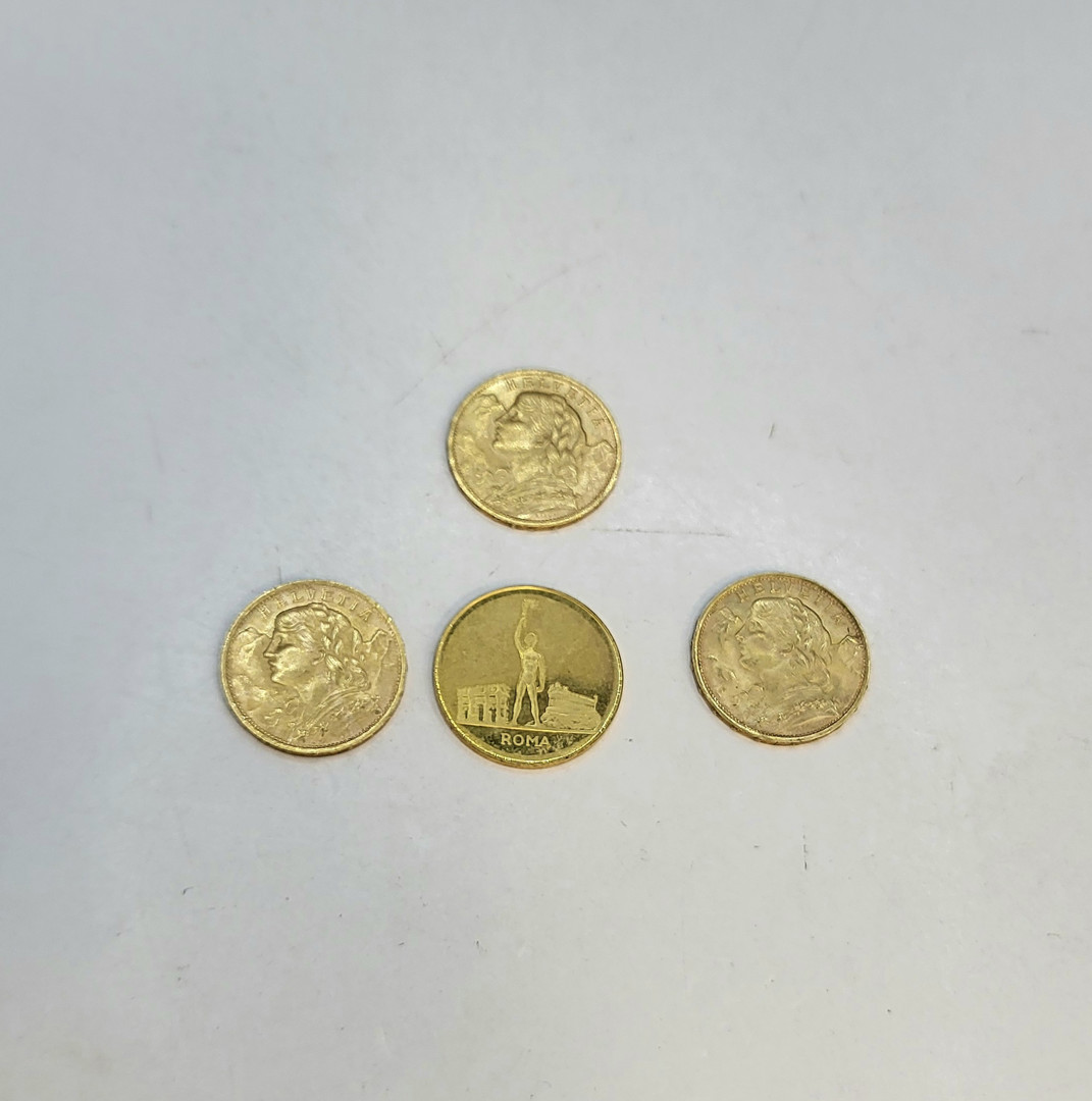 Quattro monete oro