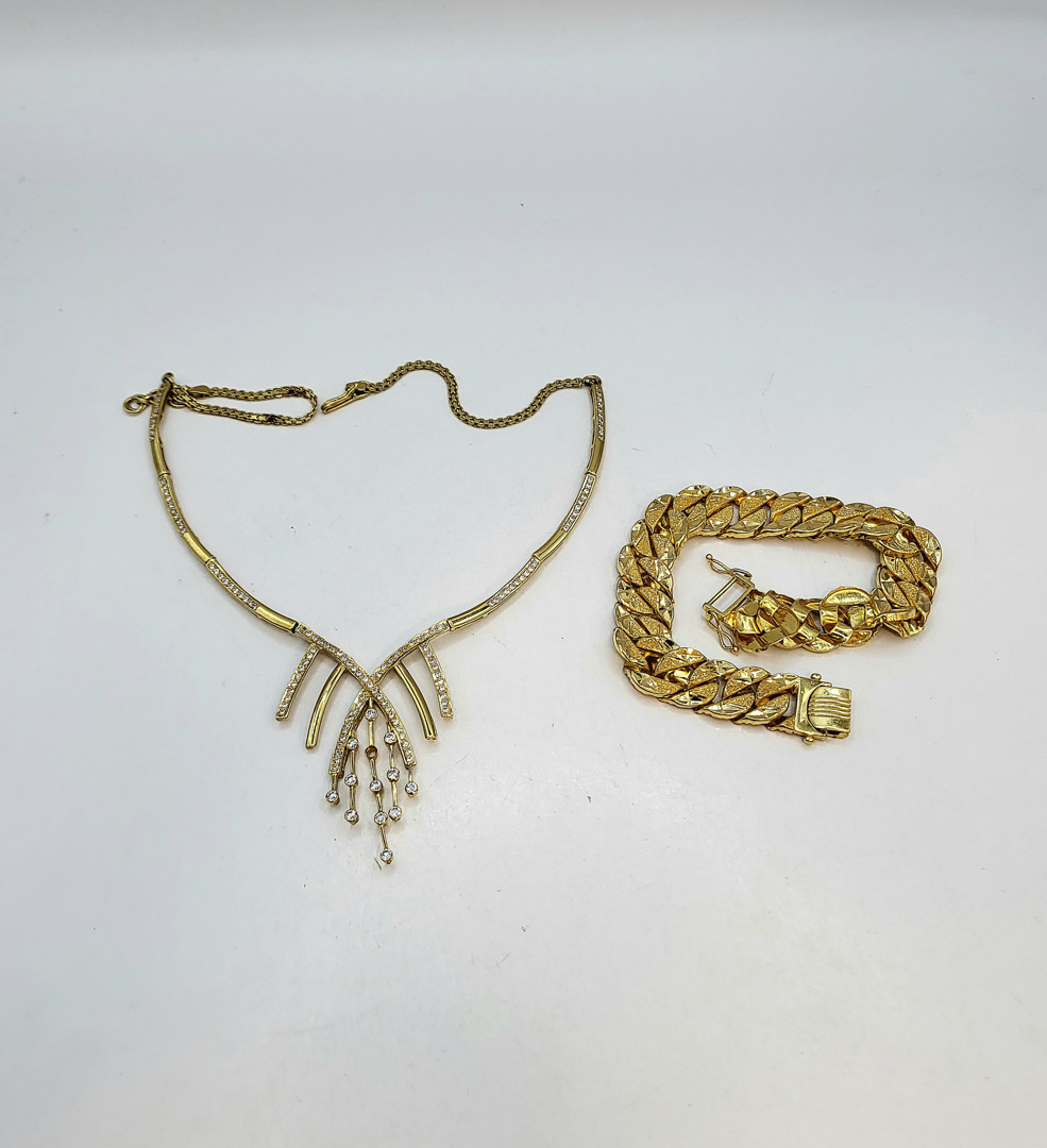 Bracciale e collana oro pietre