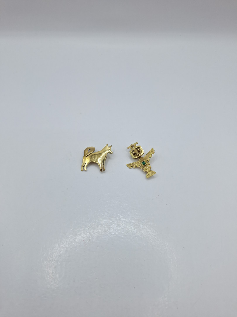 Due spille oro pietra