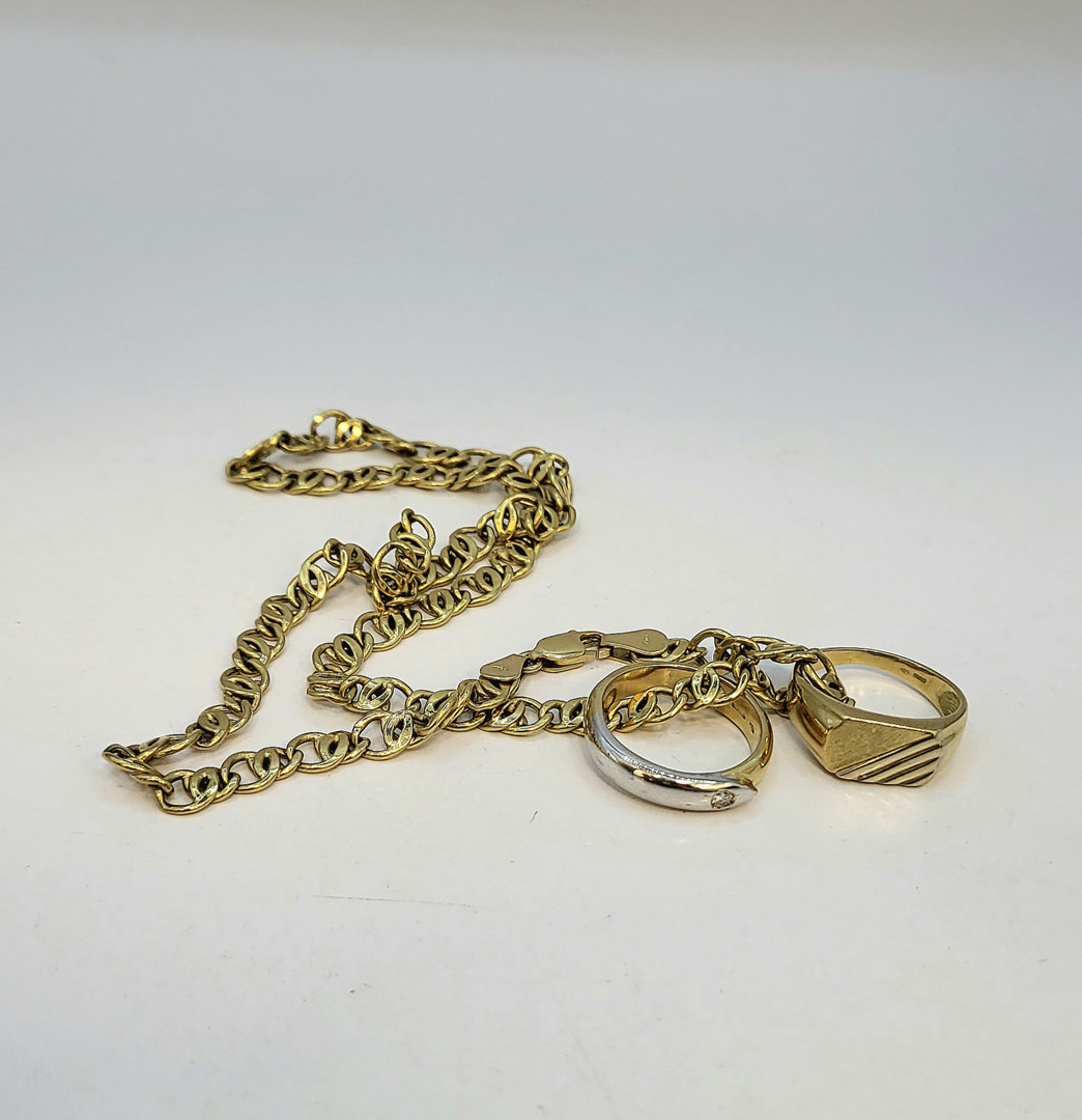 Collana e due anelli oro diamantino