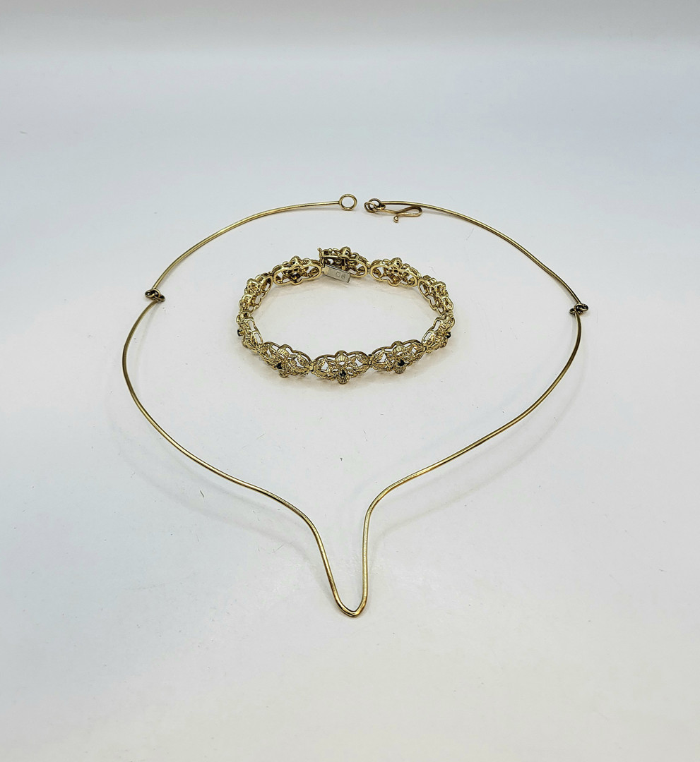Collana e bracciale oro pietre