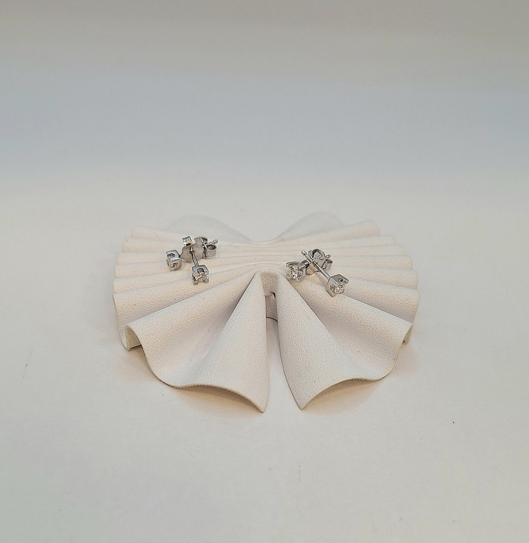 Due paia orecchini oro diamantini