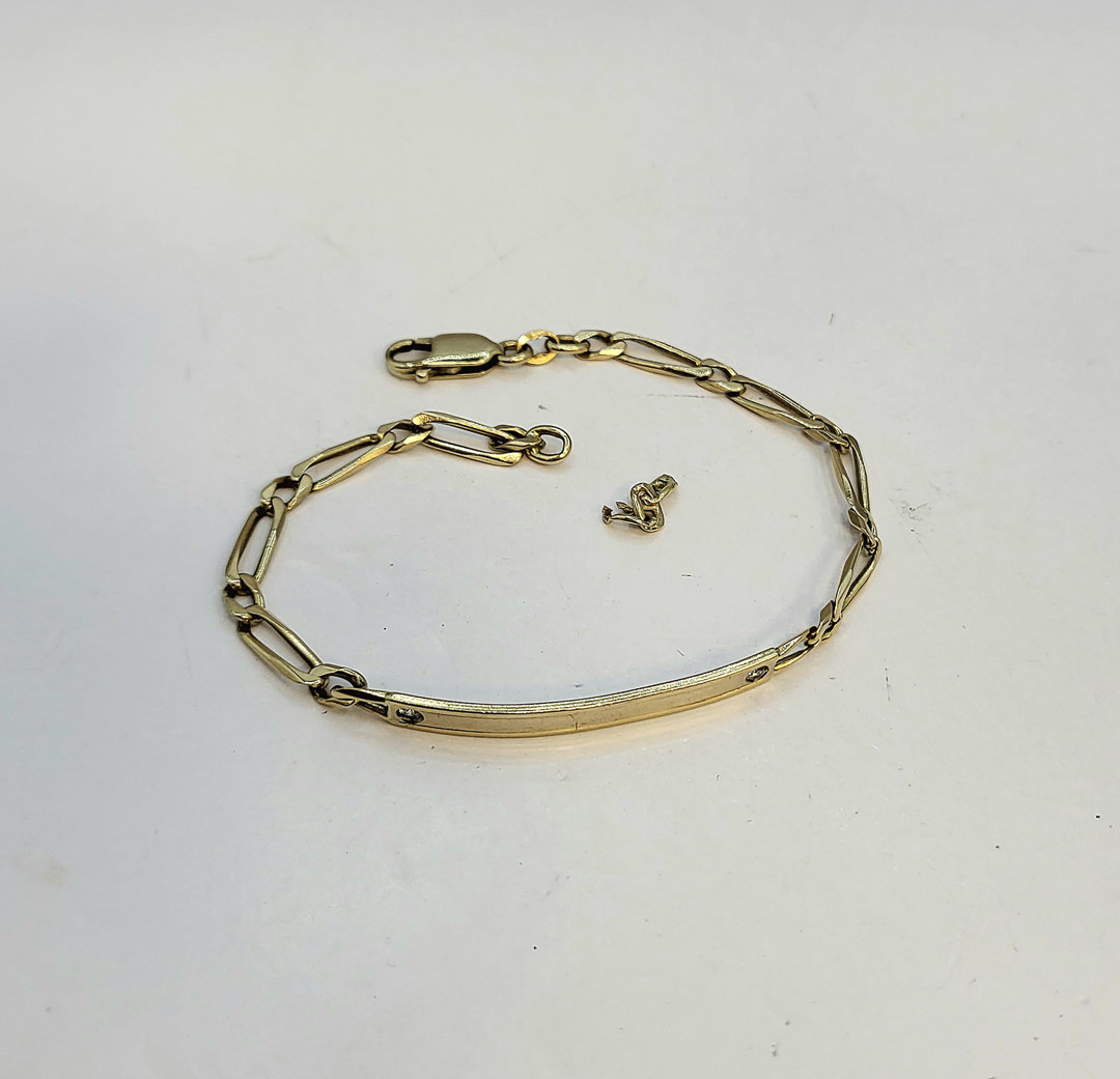Bracciale e pezzo oro