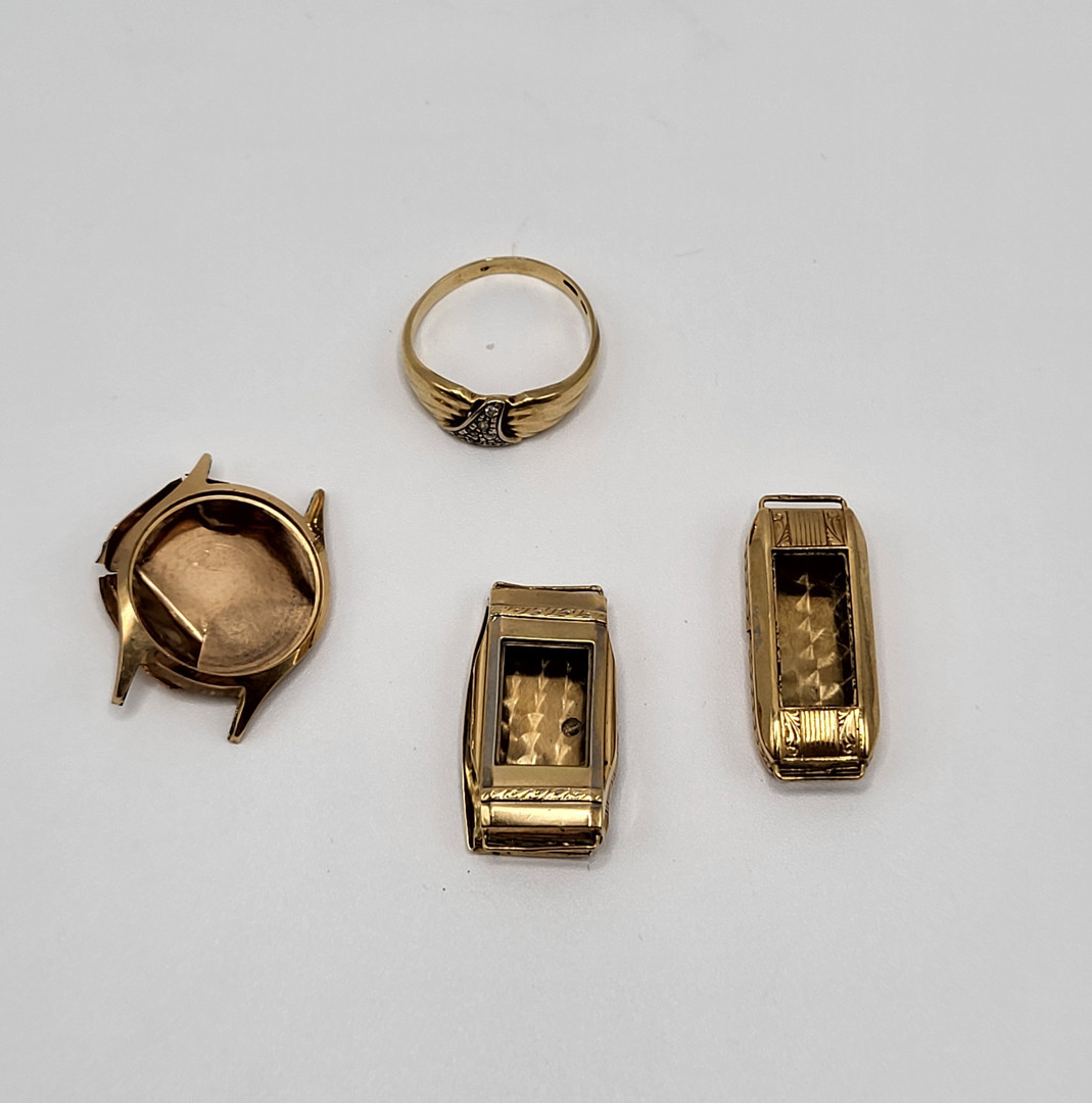 Anello e tre casse di orologi oro pietre