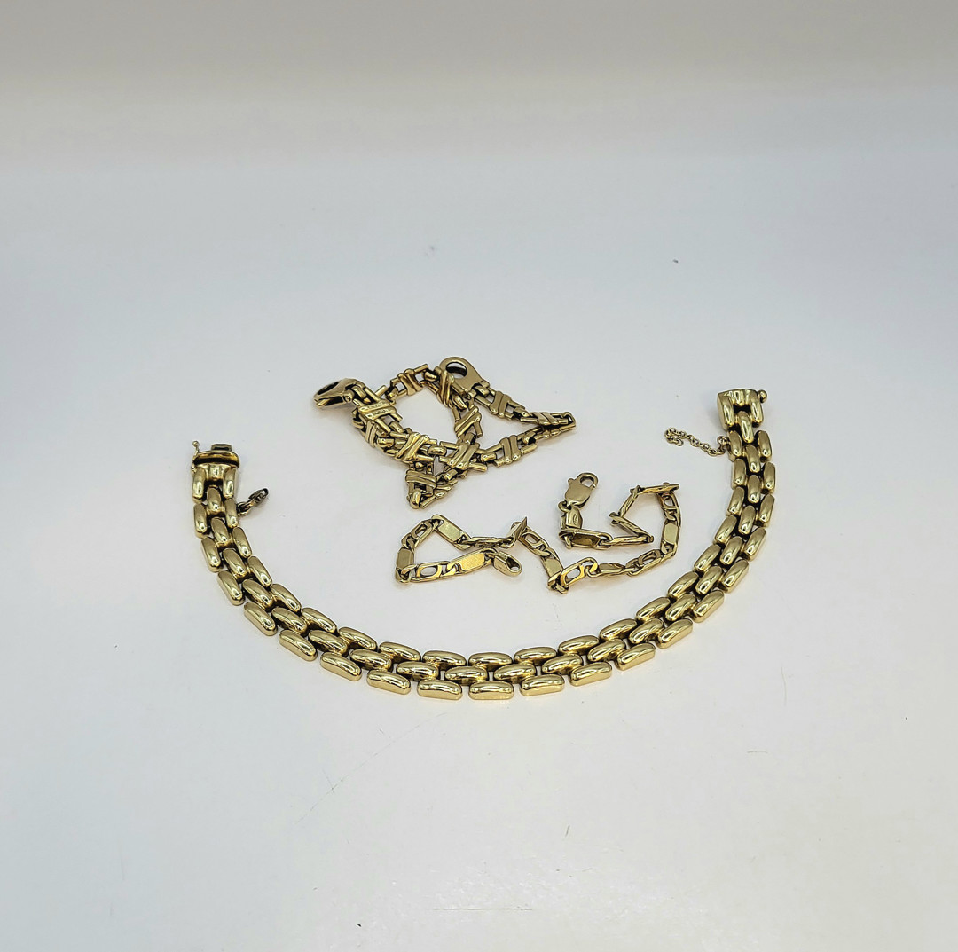Tre bracciali oro