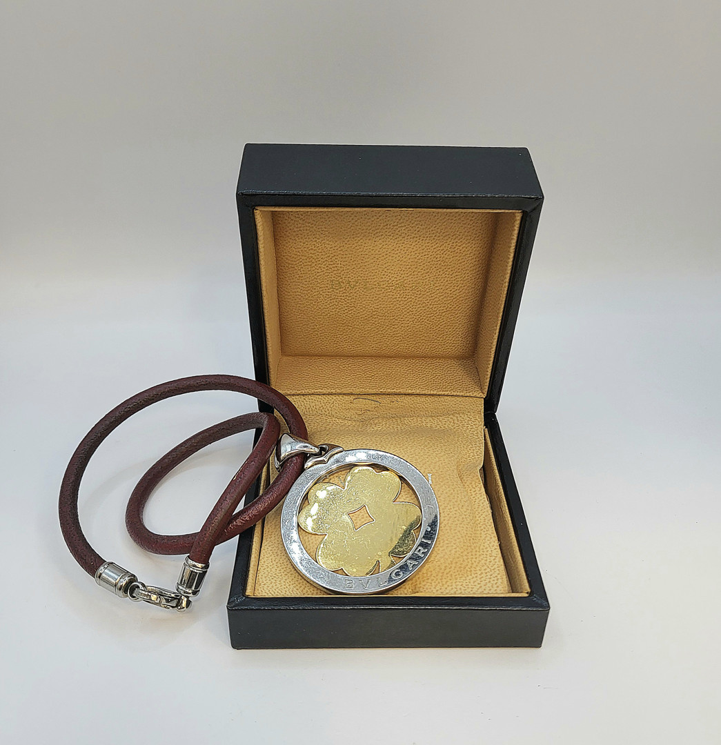 Collana e ciondolo cuoio  acciaio e oro a firma Bulgari