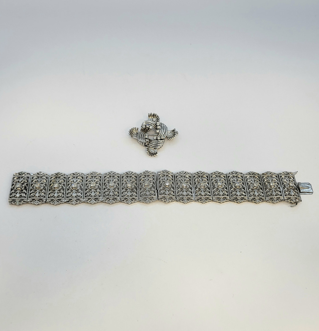 Bracciale e spilla oro diamanti