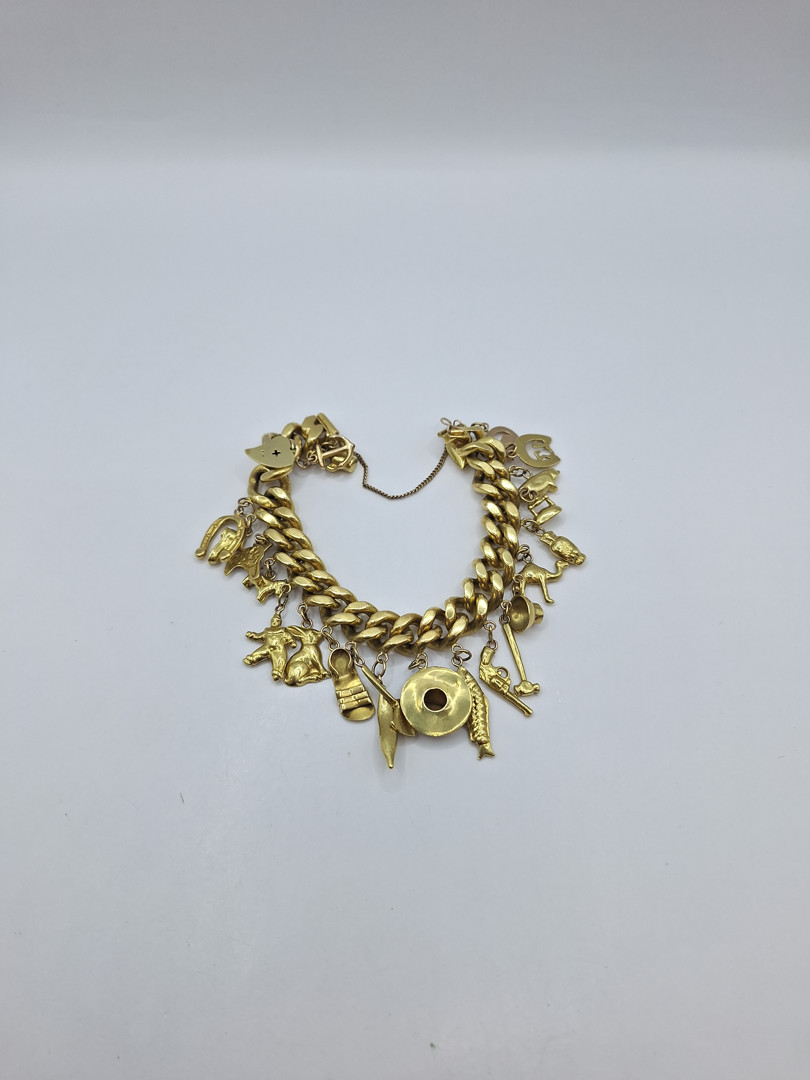 Bracciale con ciondoli oro 