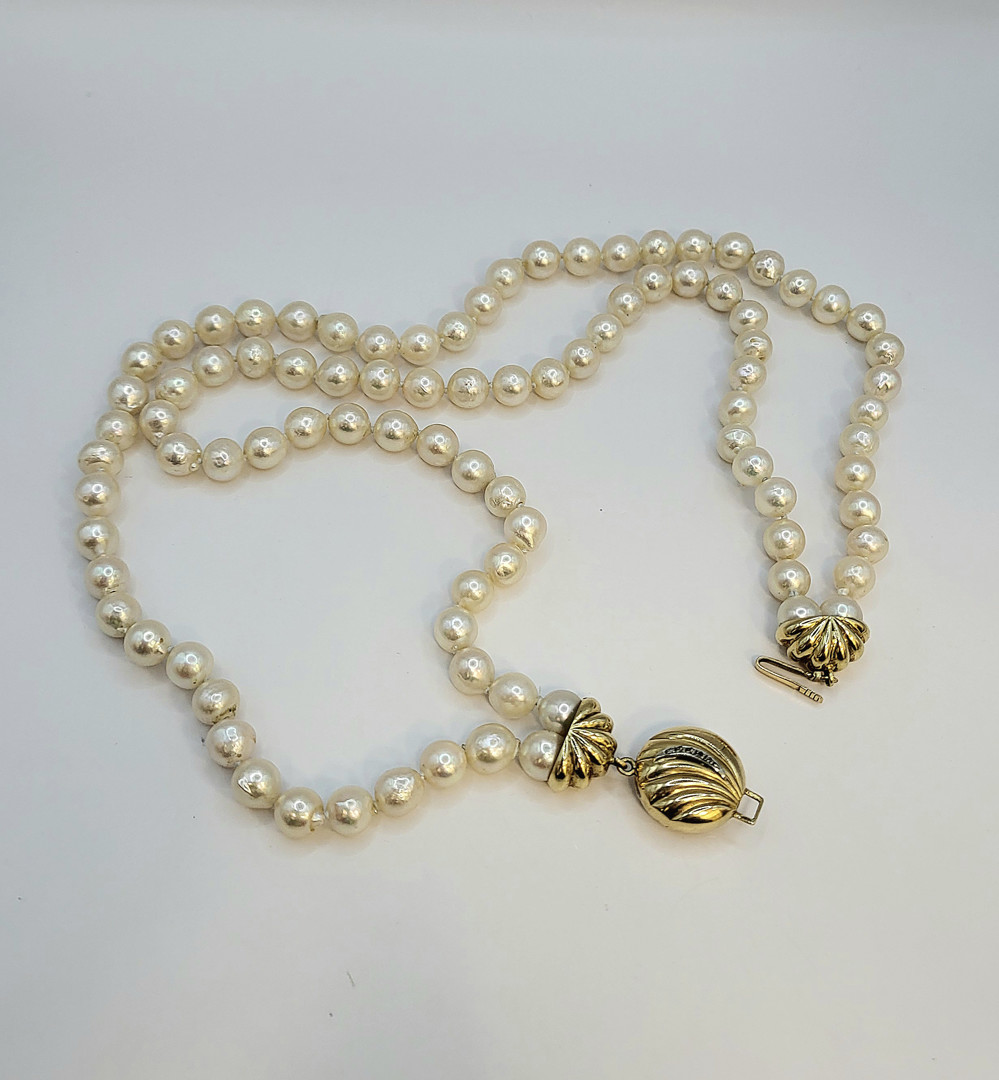 Collana perle con chiusura oro pietre
