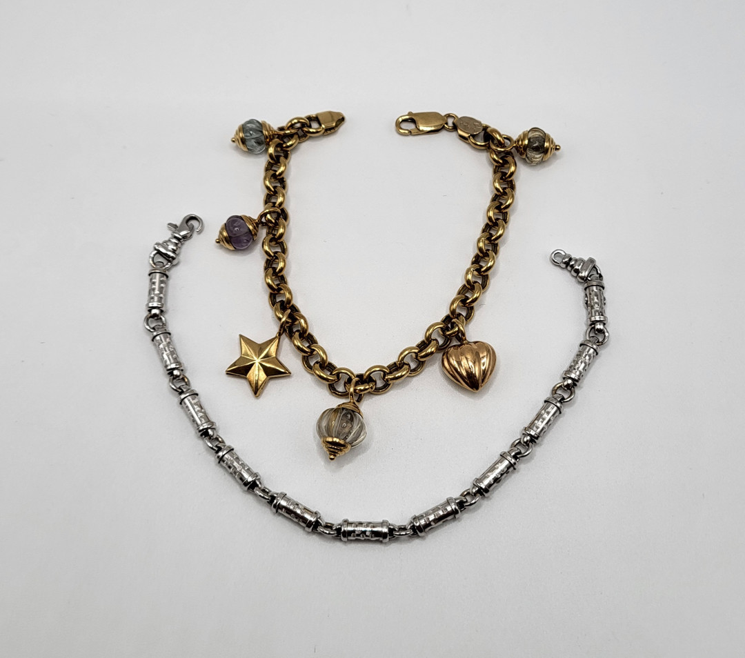Due bracciali oro pietre
