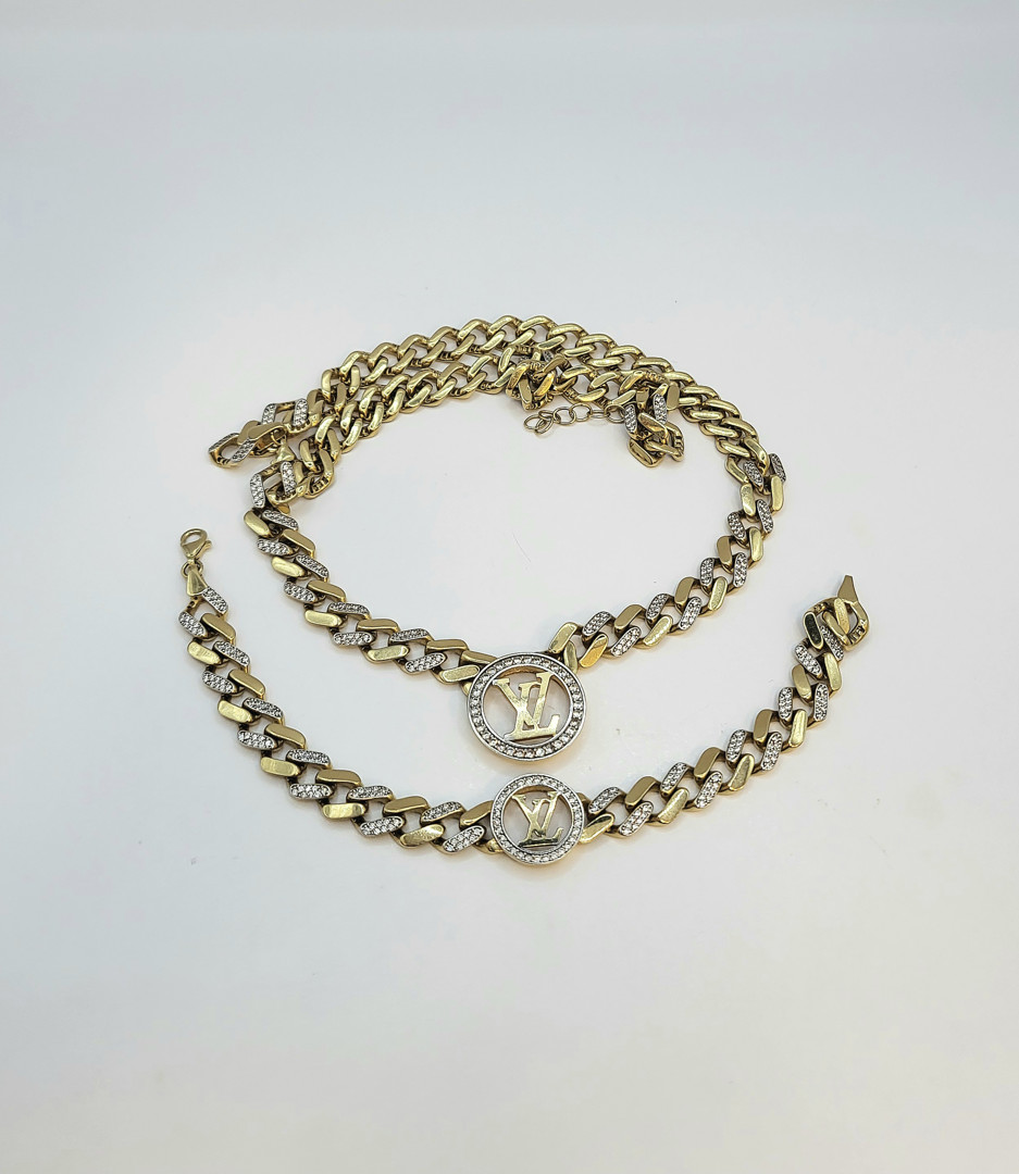 Bracciale e collana oro pietre