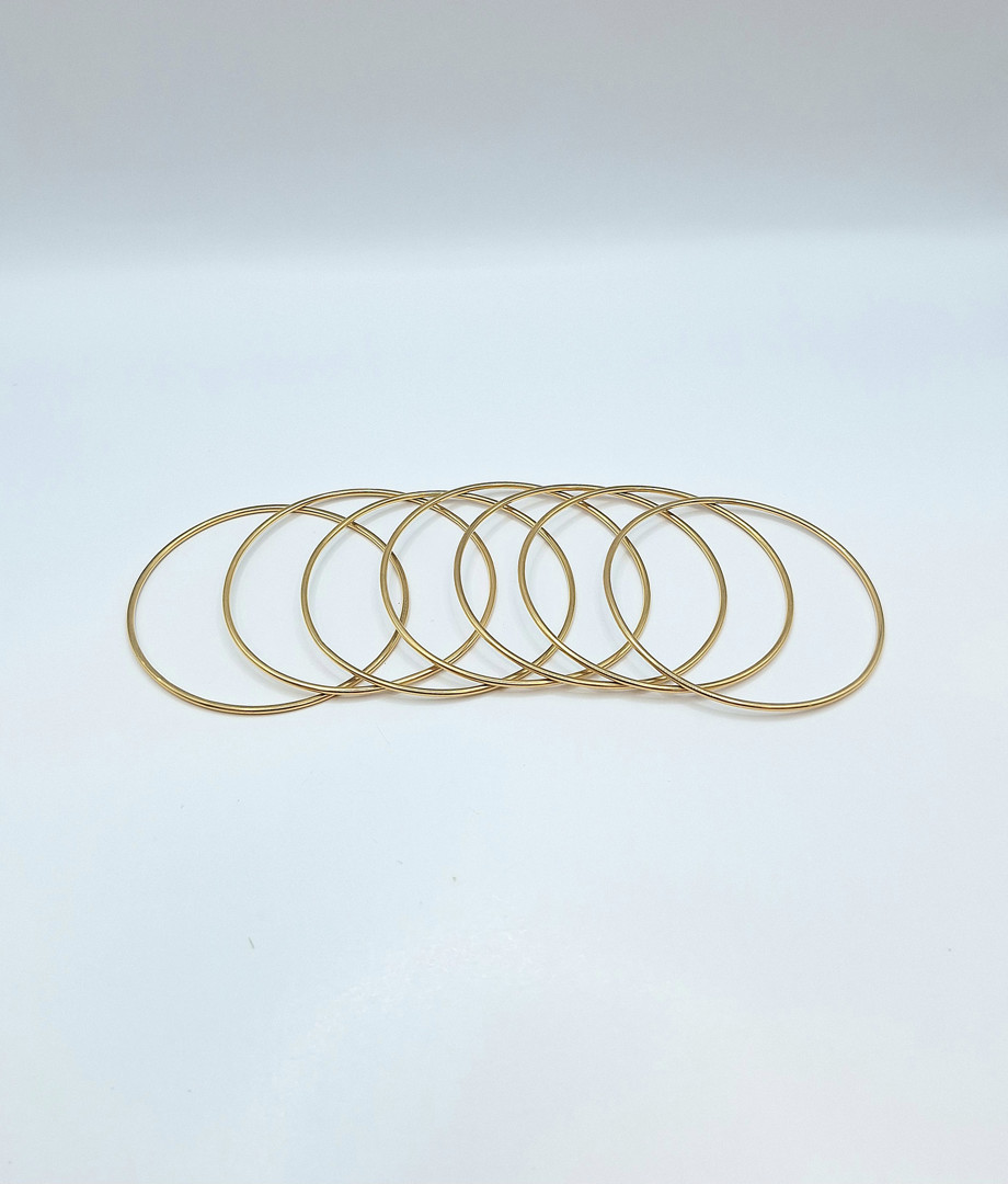 Sette bracciali oro