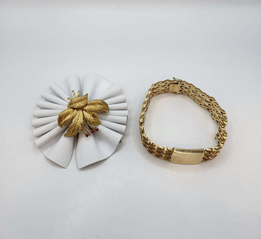 Bracciale e spilla oro pietre