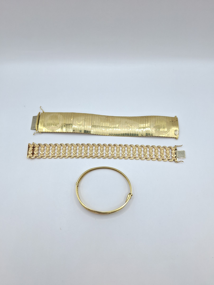 Tre bracciali oro 