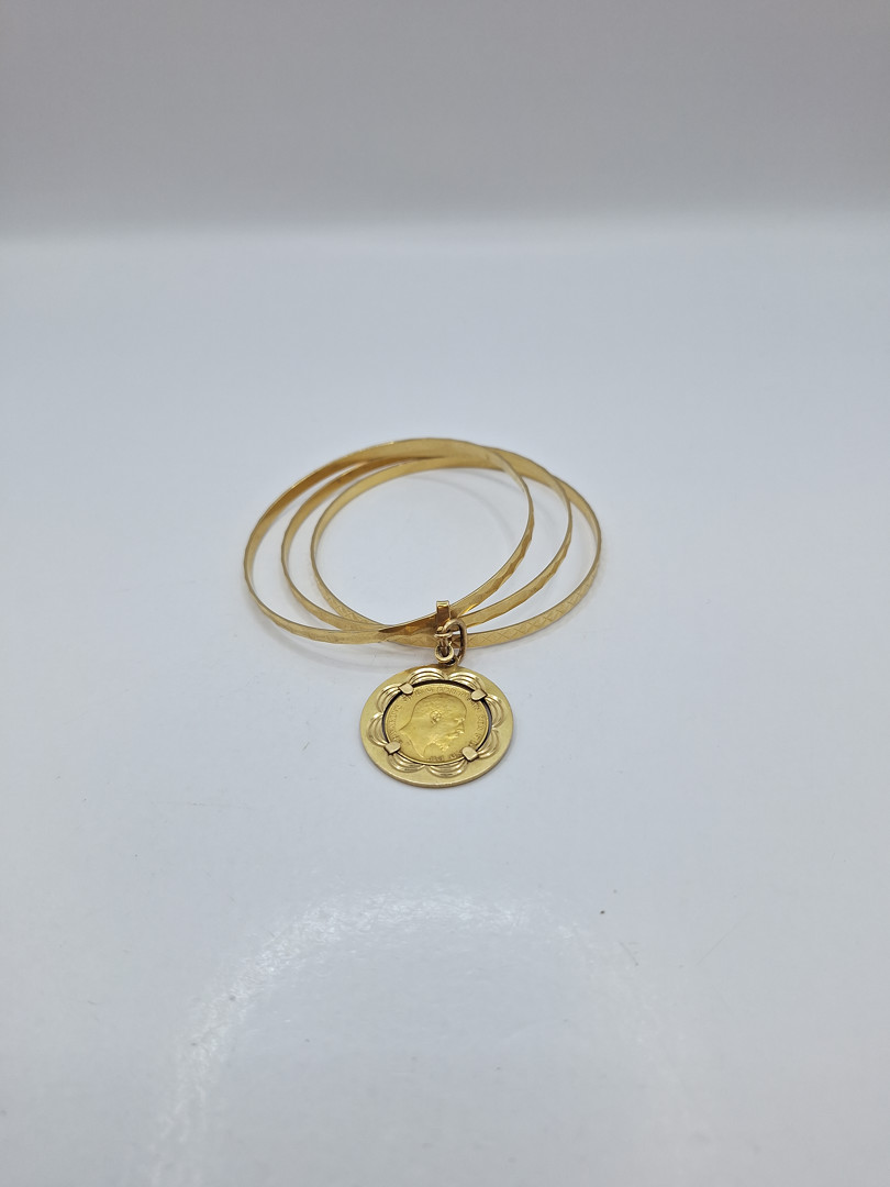 Bracciale con sterlina oro