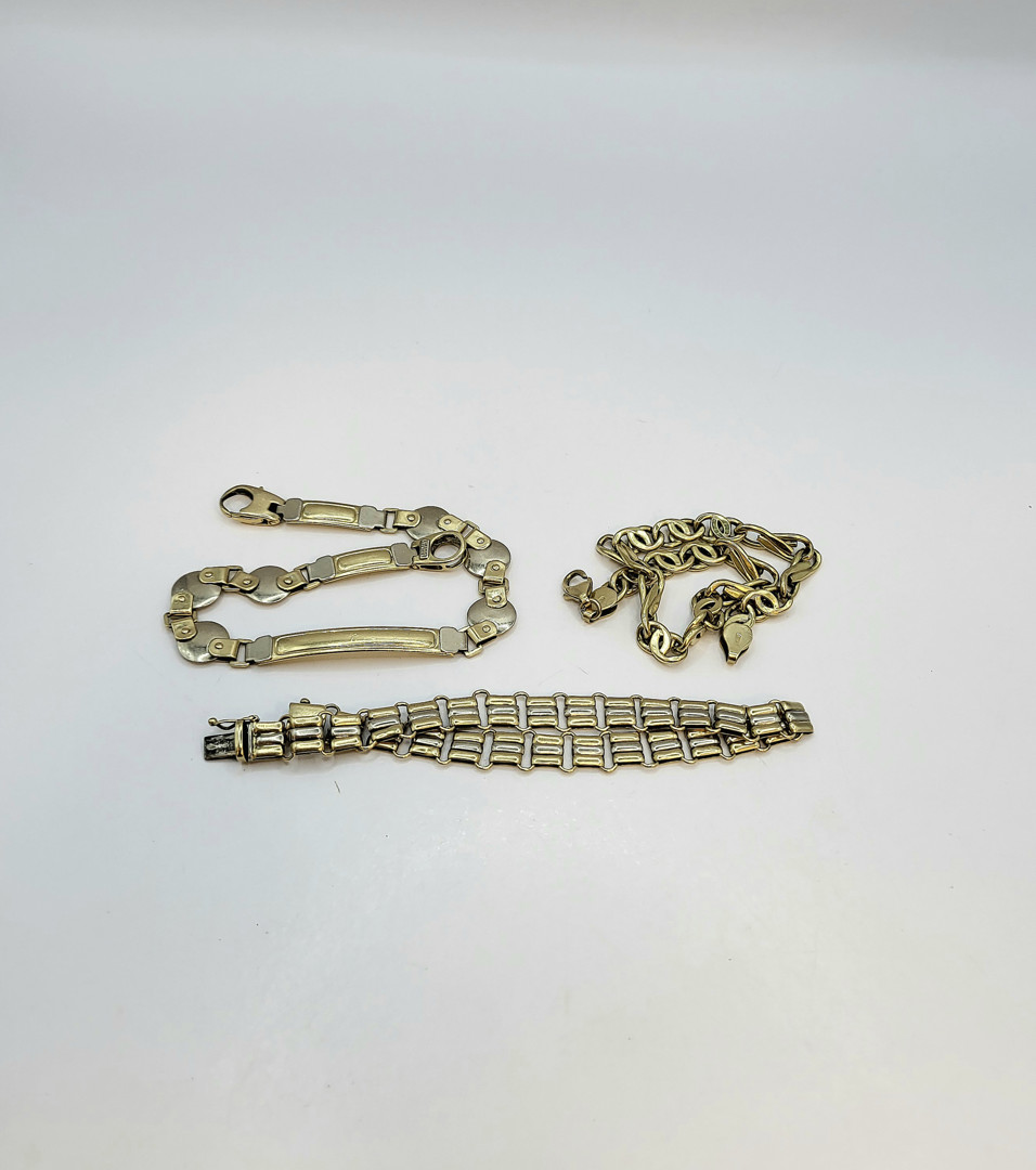 Tre bracciali oro 