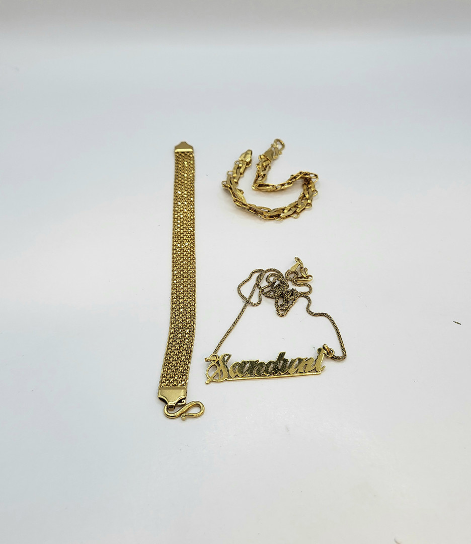 Collana e due bracciali oro 