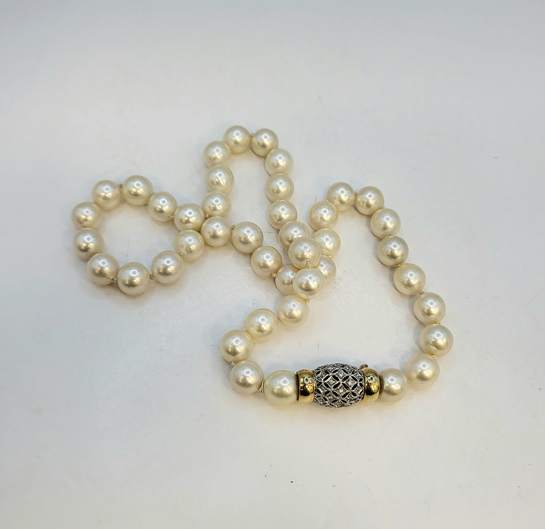 Filo perle con fermaglio oro diamanti
