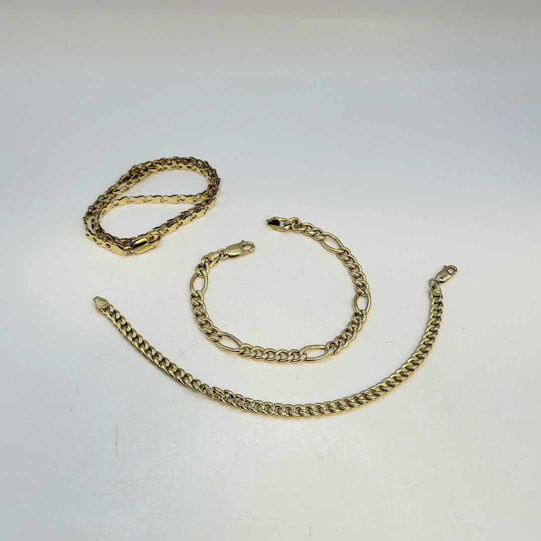 Collana e due bracciali oro