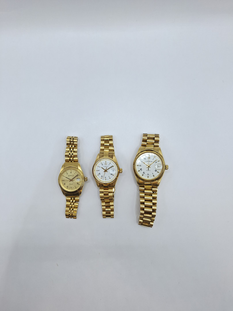 Tre orologi oro