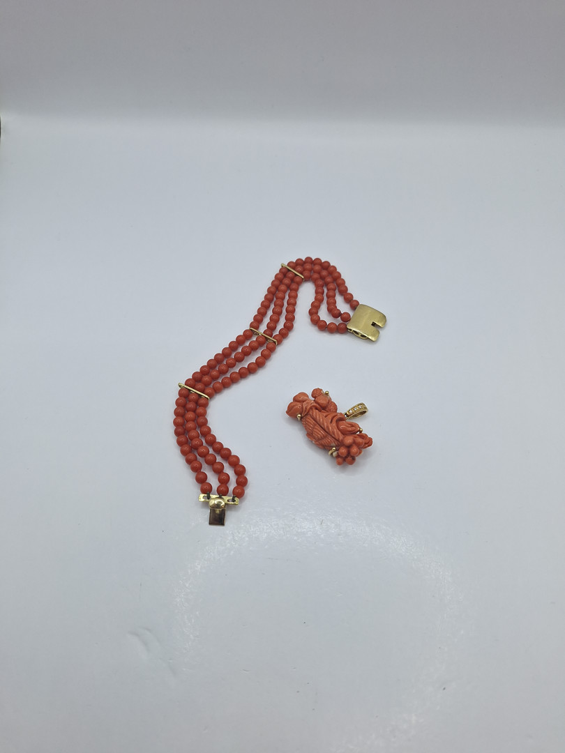 Bracciale ciondolo oro coralli diamantini