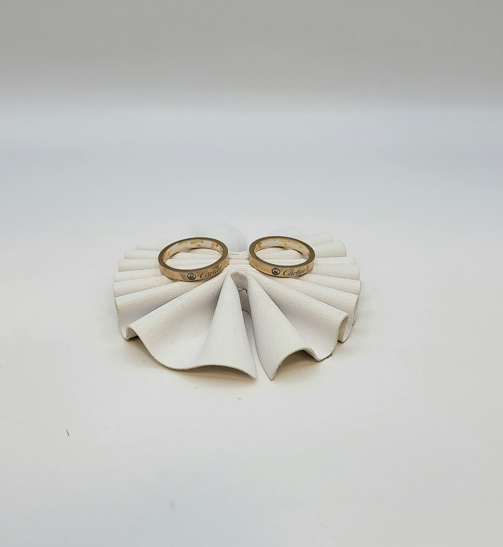 Due anelli a firma Cartier oro diamanti