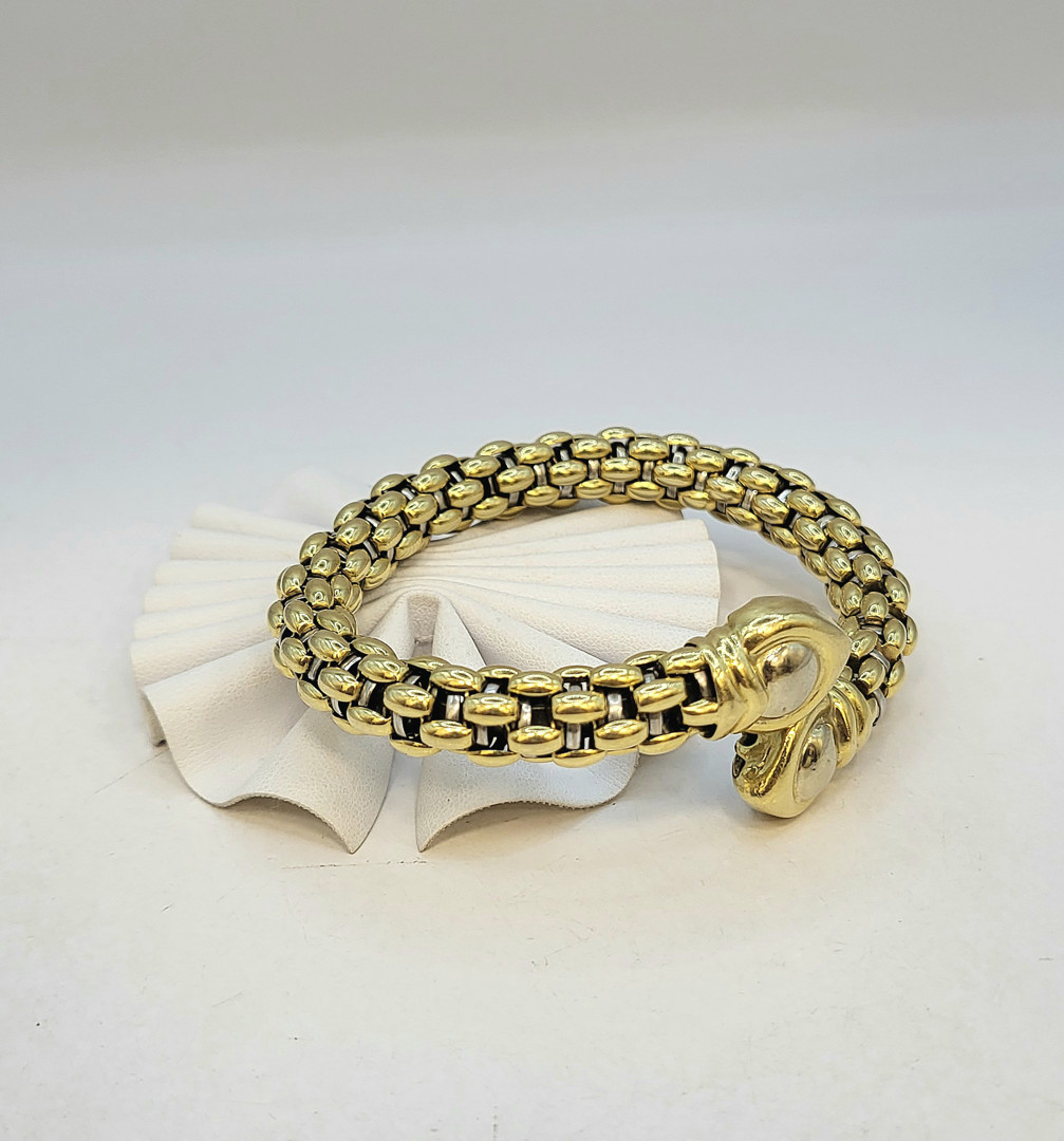 Bracciale a firma Fope oro metallo