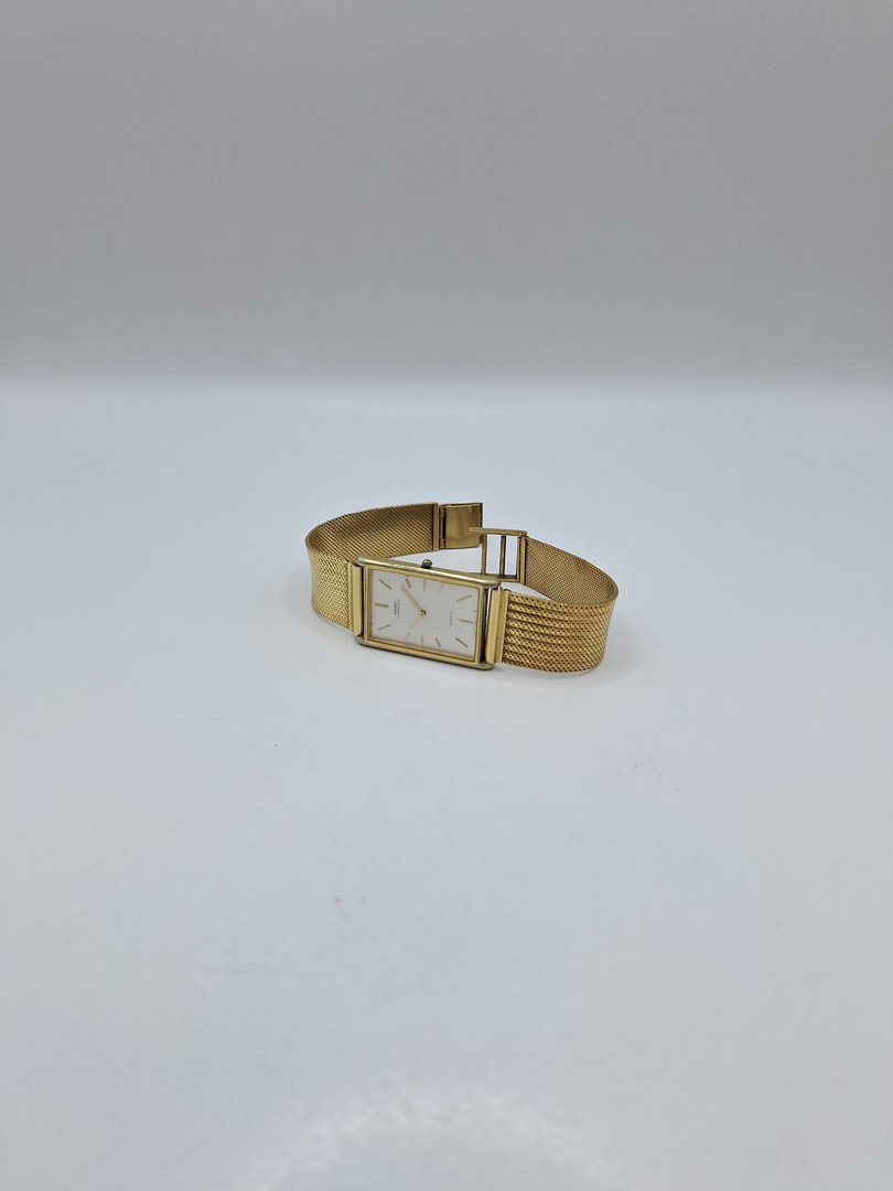 Orologio con bracciale oro e cassa in metallo