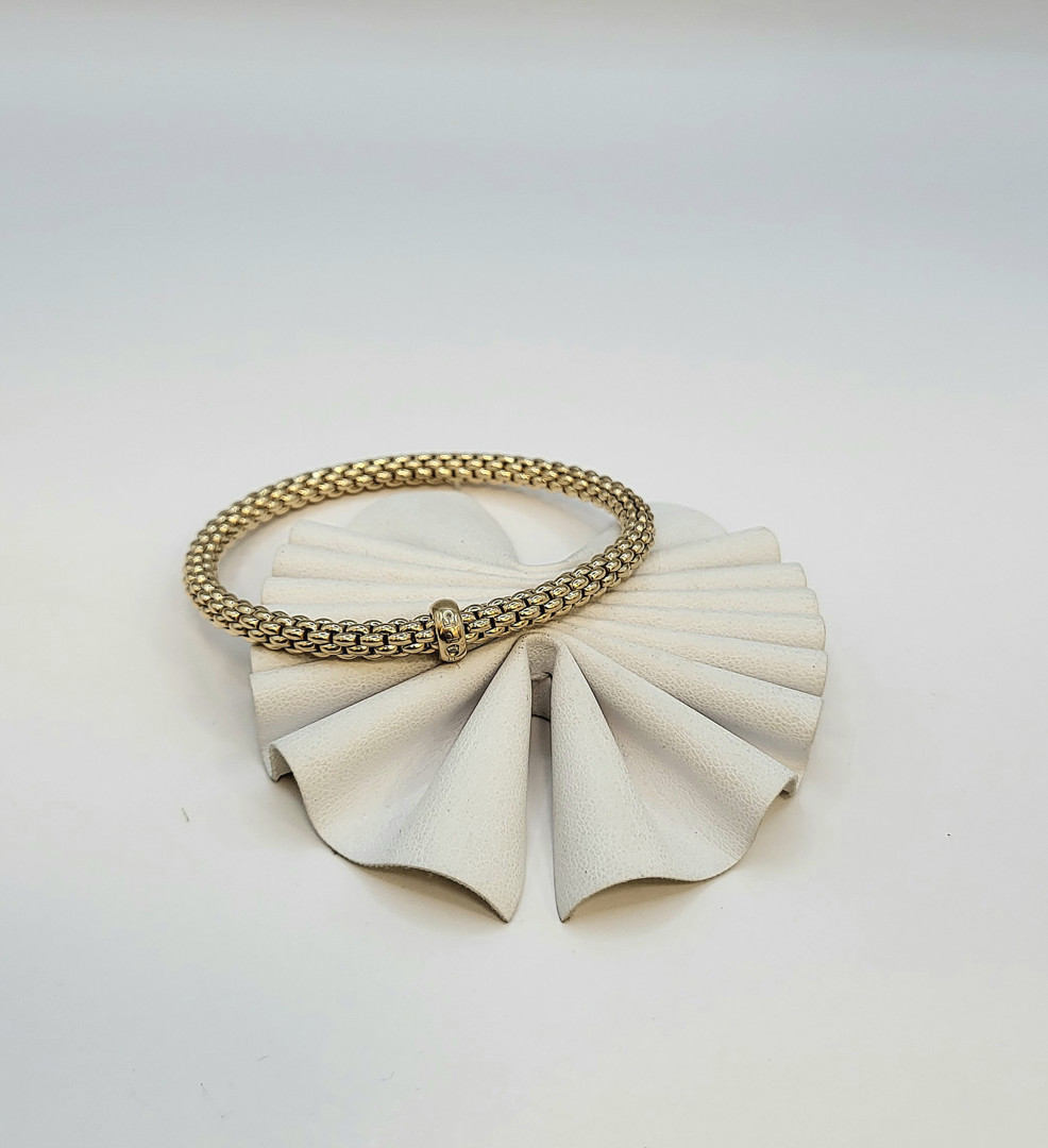 Bracciale a firma Fope oro diamantino
