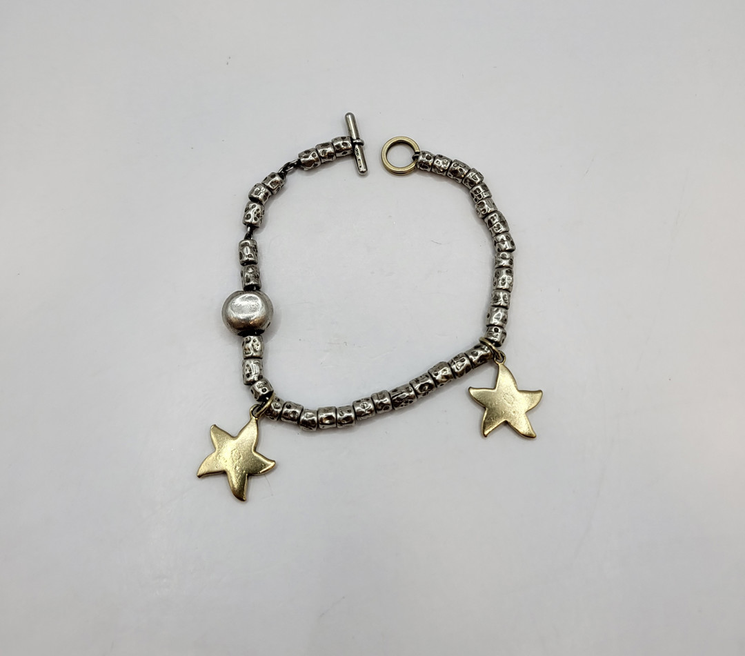 Bracciale argento con ciondoli oro a firma Dodo