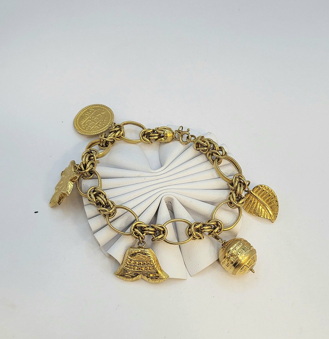 Bracciale con ciondoli oro 