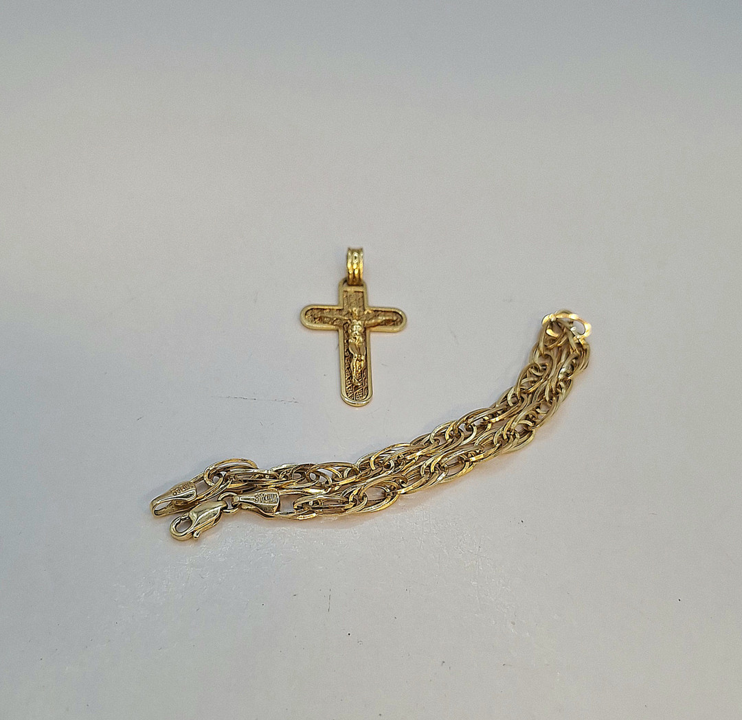 Croce e bracciale oro